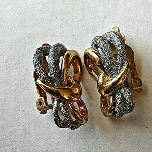 Vintage High jewelry infinity sparkle silver and gold clip on earrings.